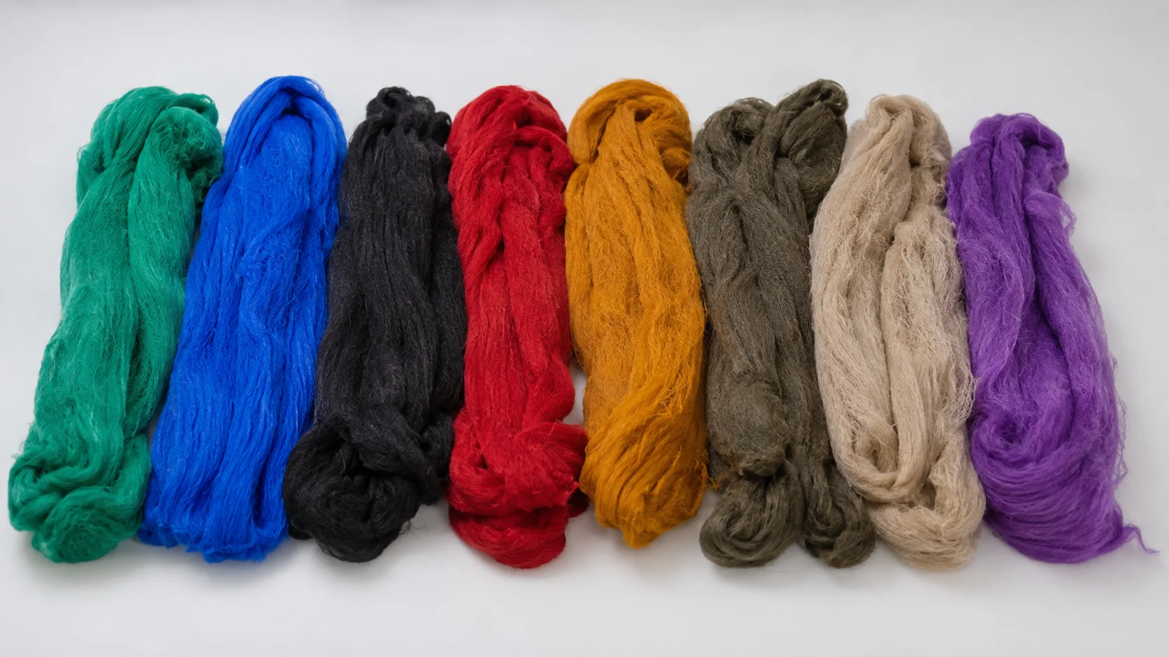 Coloured polyester fibre and fabric applications